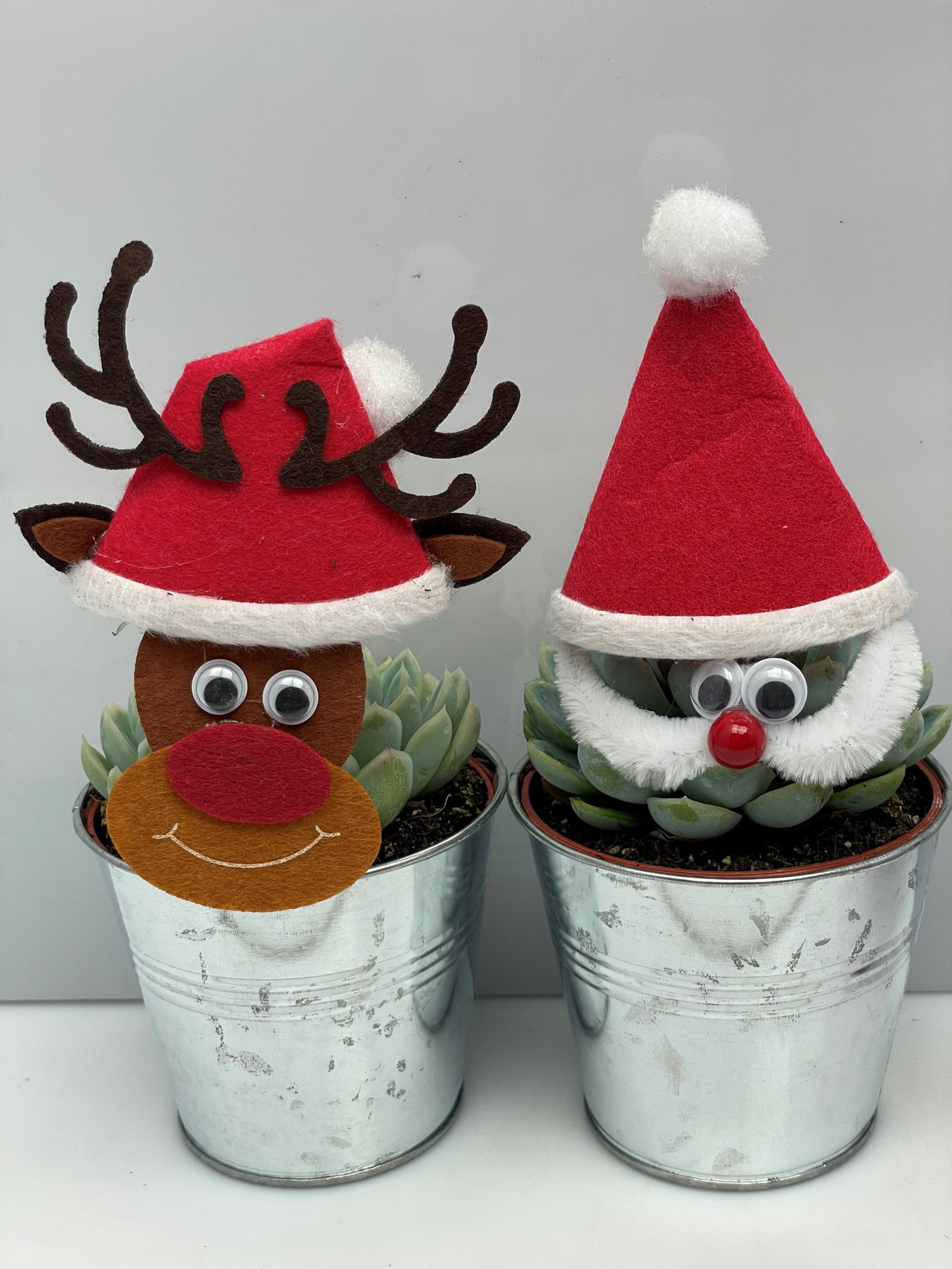 957 50%Kerstman+50%Reindeer vet zink8,5cm Engeland, D 9,5 cm